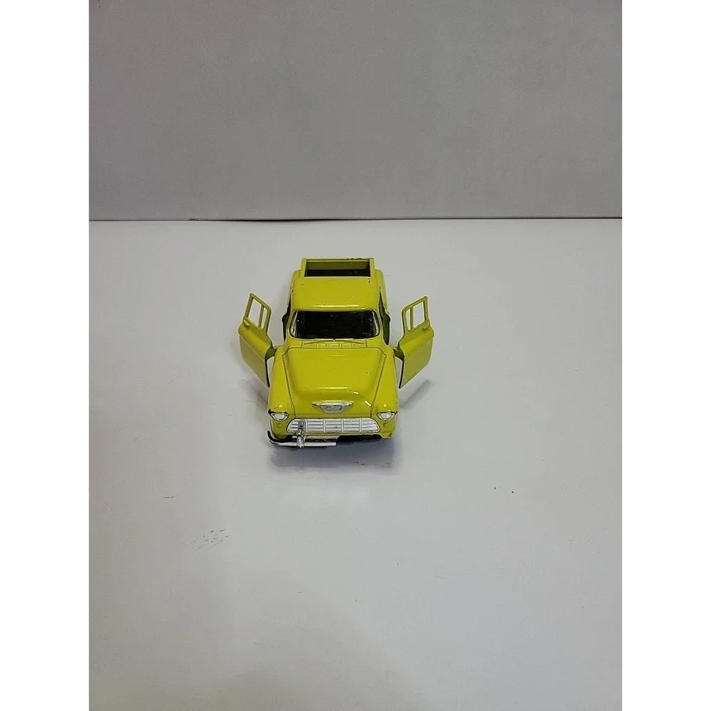 Kinsmart Pull Back Yellow 1955‎ Chevy Stepside Pickup Truck with Surfboard 1:32